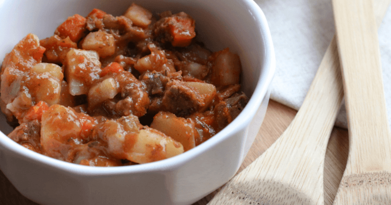 close up photo of beef stew made with leftover roast beef, bacon, potatoes, and carrots