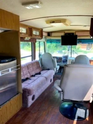 interior view of motorhome living space and drivers area.
