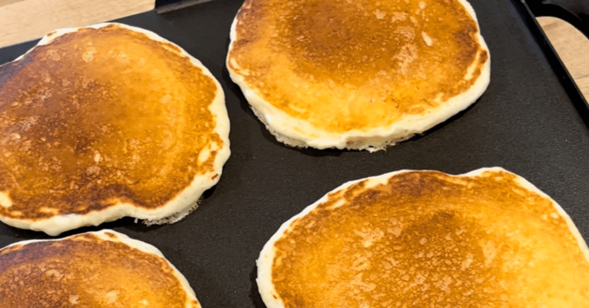 buttermilk pancakes on black electic griddle
