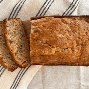 sliced banana bread on cutting board