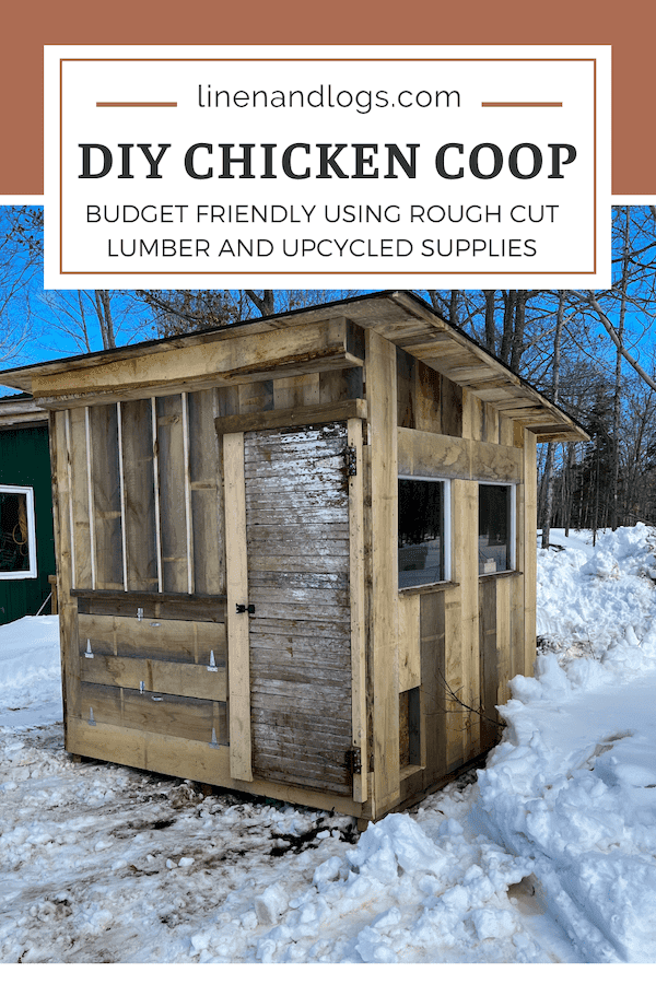 rough cut lumber chicken coop with windows and chicken door