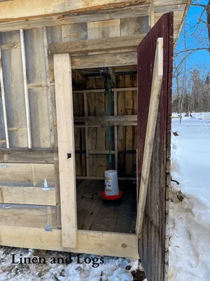 DIY Chicken Coop man door with plug in chicken waterer