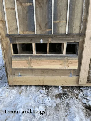 exterior access to chicken nesting boxes on a chicken coop