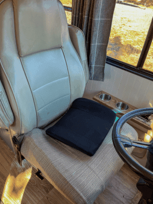 Drivers seat recovered and custom made cup holders in class a rv motorhome