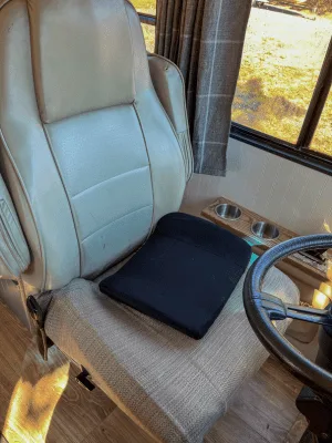 Drivers seat recovered and custom made cup holders in class a rv motorhome