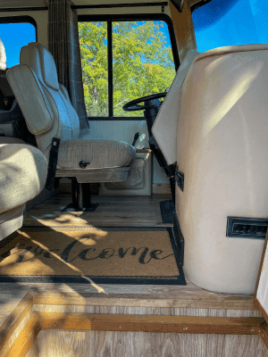 class a motorhome cockpit - looking in from the door to drivers seat