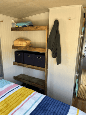 RV Remodel bedroom with open shelves