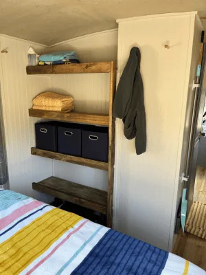 RV Remodel bedroom with open shelves